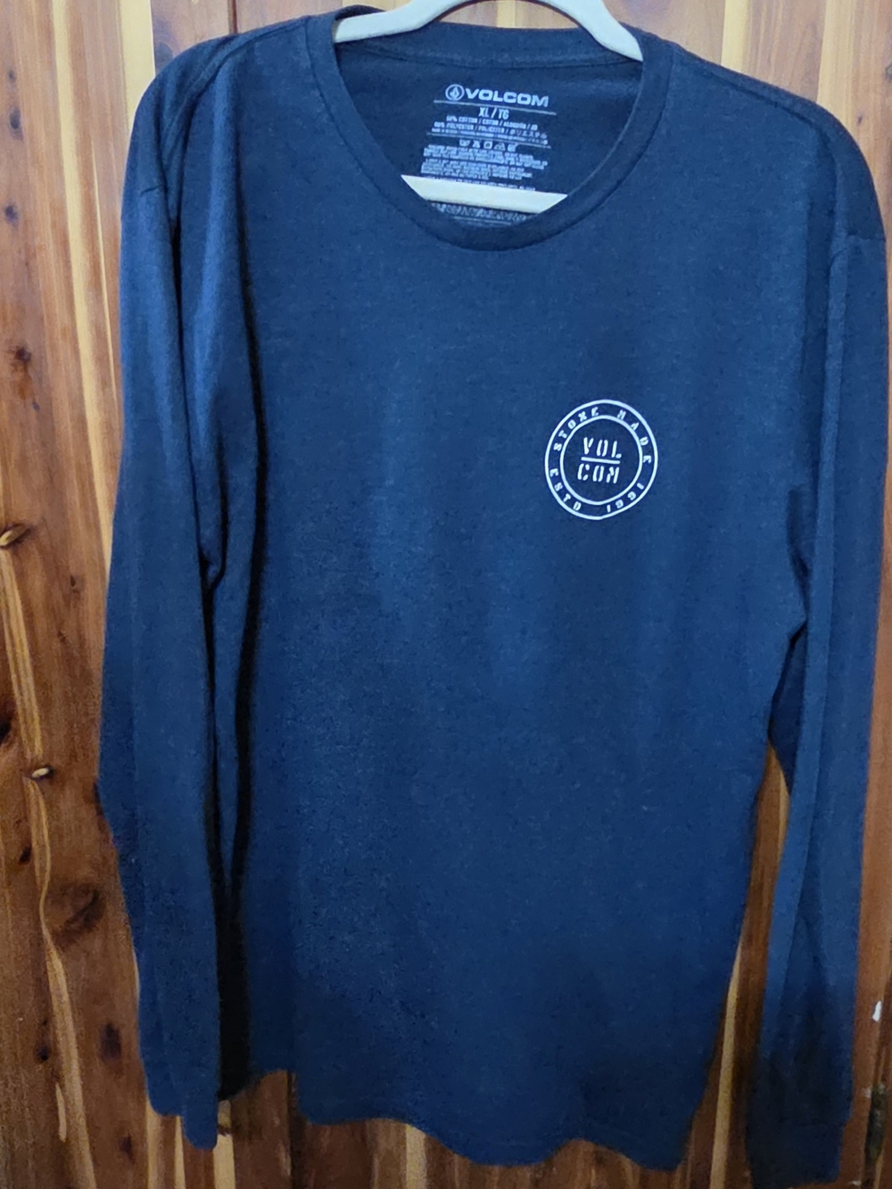 Volcom Navy Blue Long Sleeve Crew Tee with Small Chest Emblem Large Logo On Back